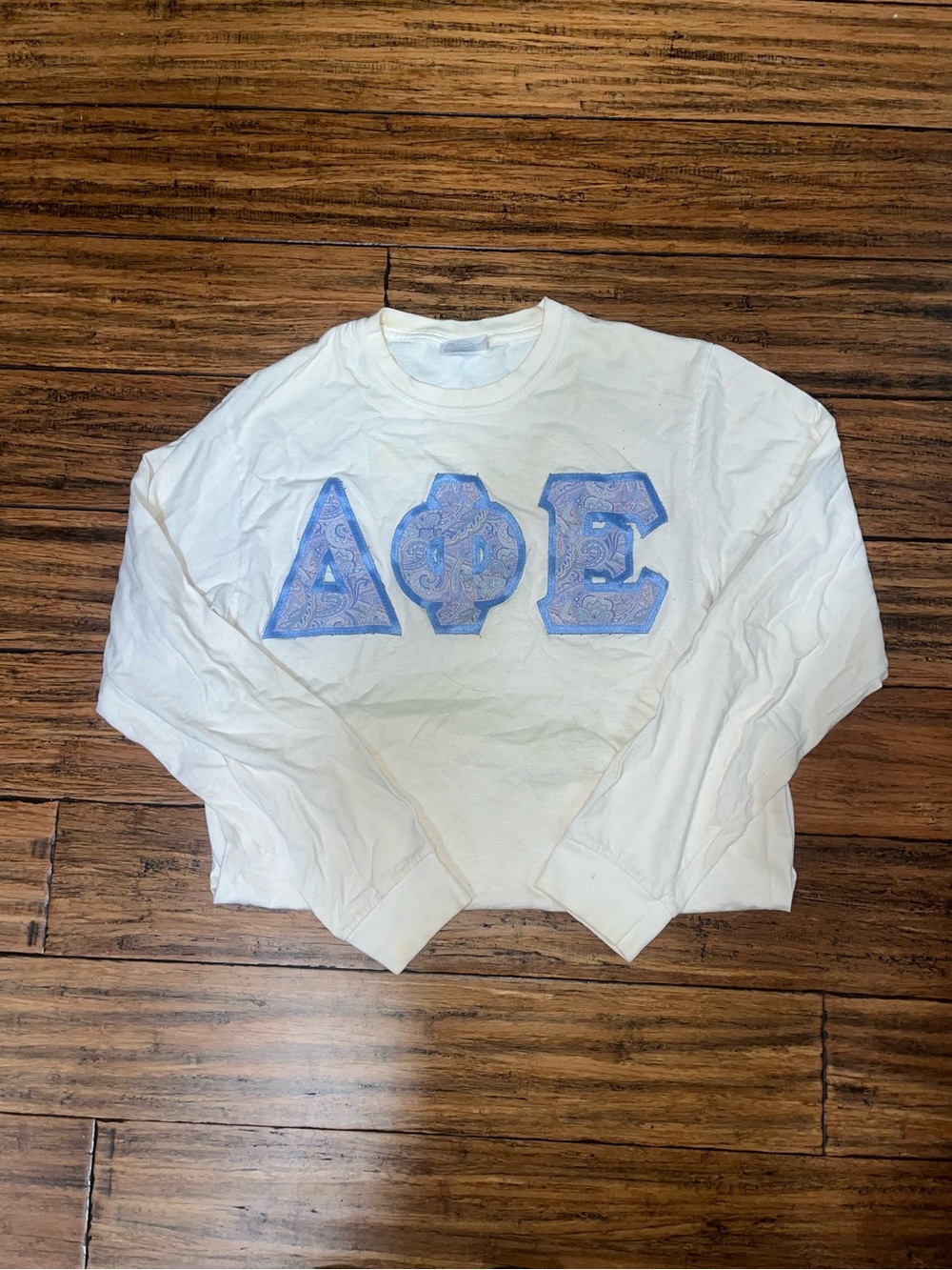 Women's White Long-Sleeve DPhiE Shirt with Blue Appliqué Letters